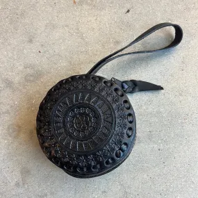 Embossed Circle Wristlet