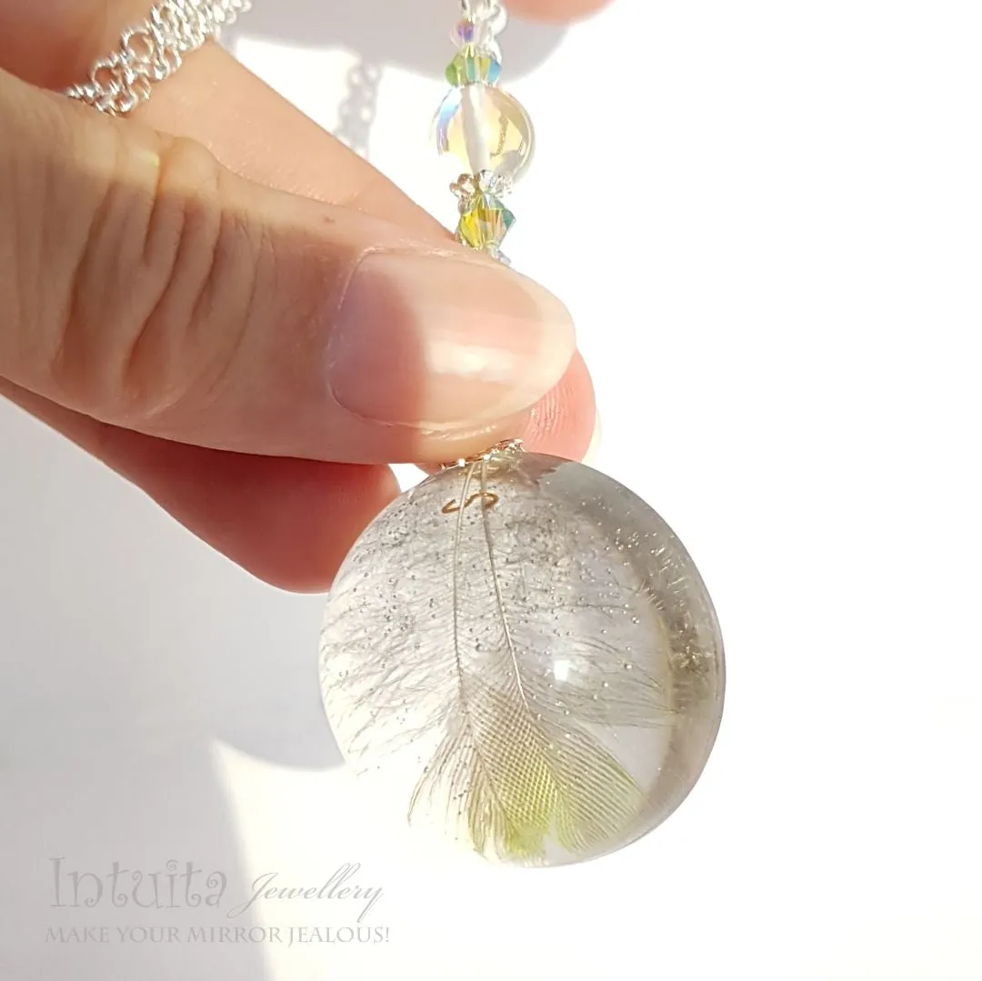 Handmade Semisphere Resin Pendant with Real Parrot Feathers Inside