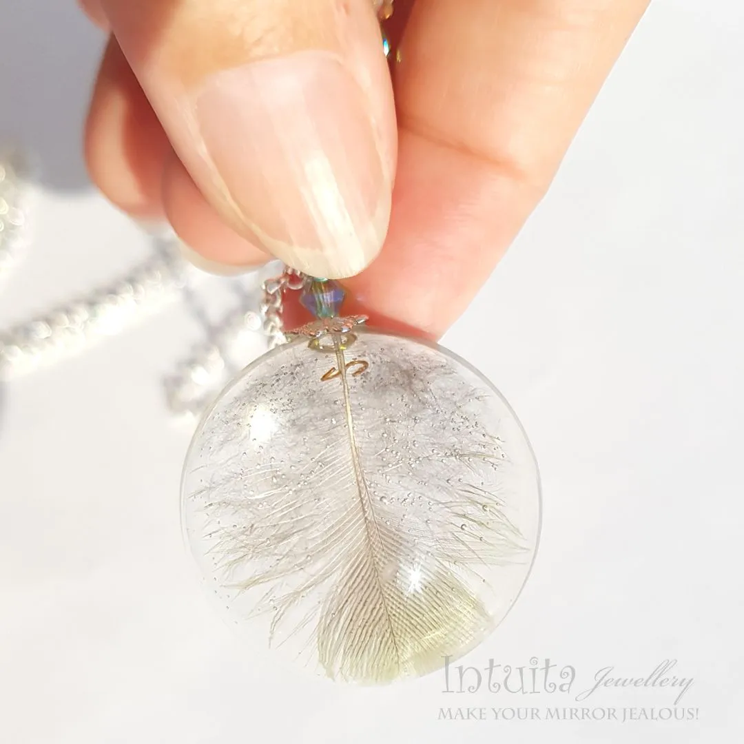 Handmade Semisphere Resin Pendant with Real Parrot Feathers Inside