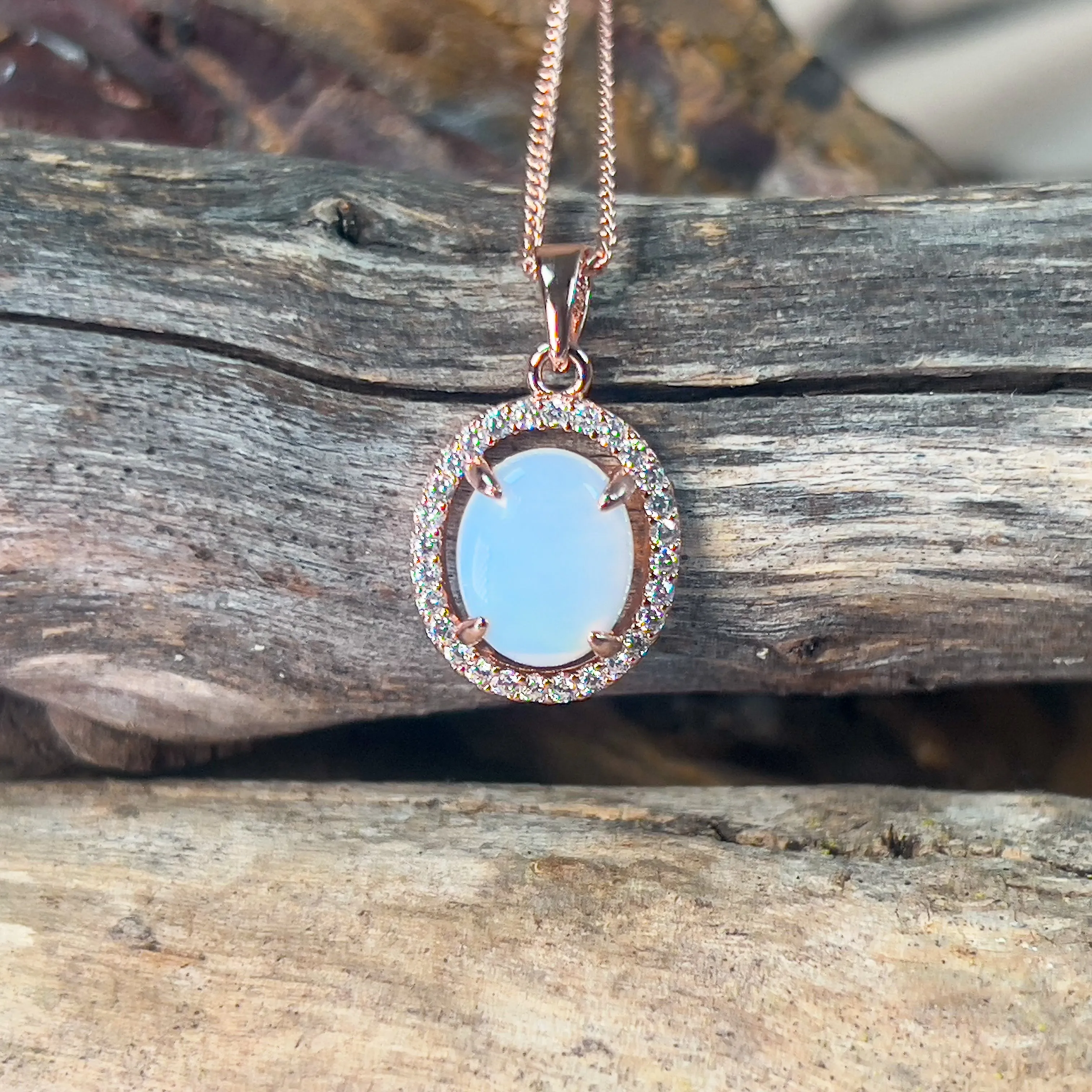Rose Gold plated Halo 10x8mm White Opal silver pendant