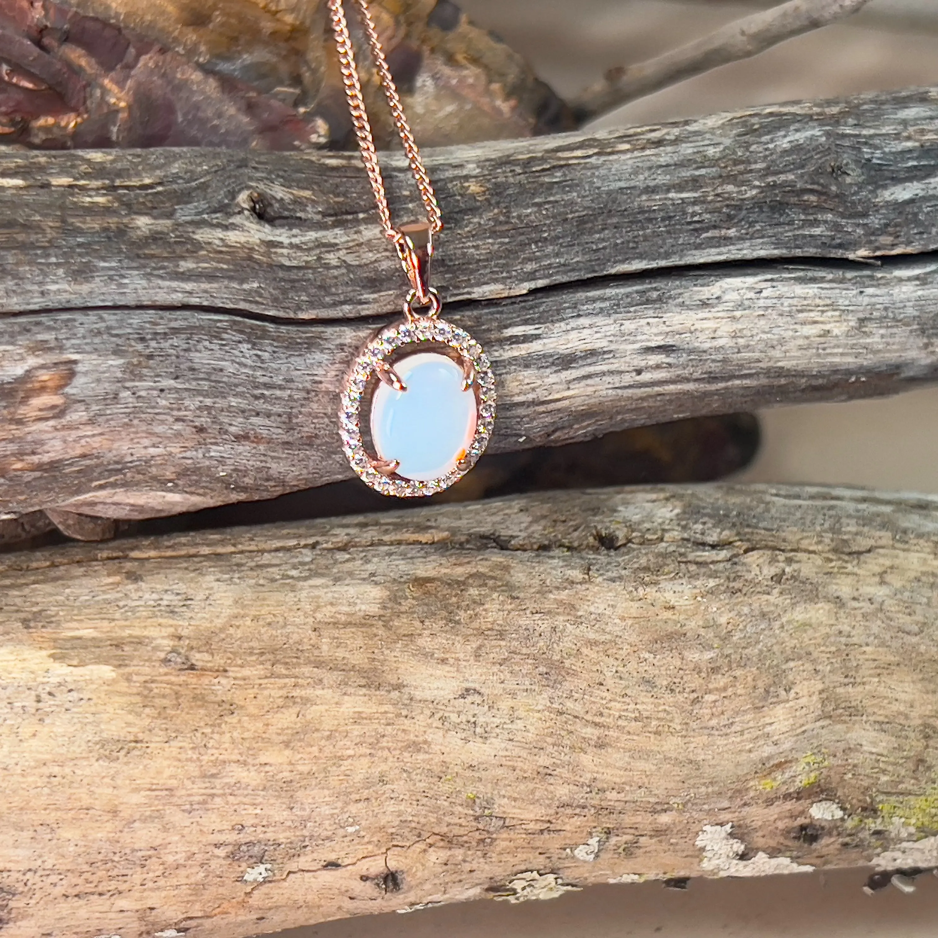 Rose Gold plated Halo 10x8mm White Opal silver pendant