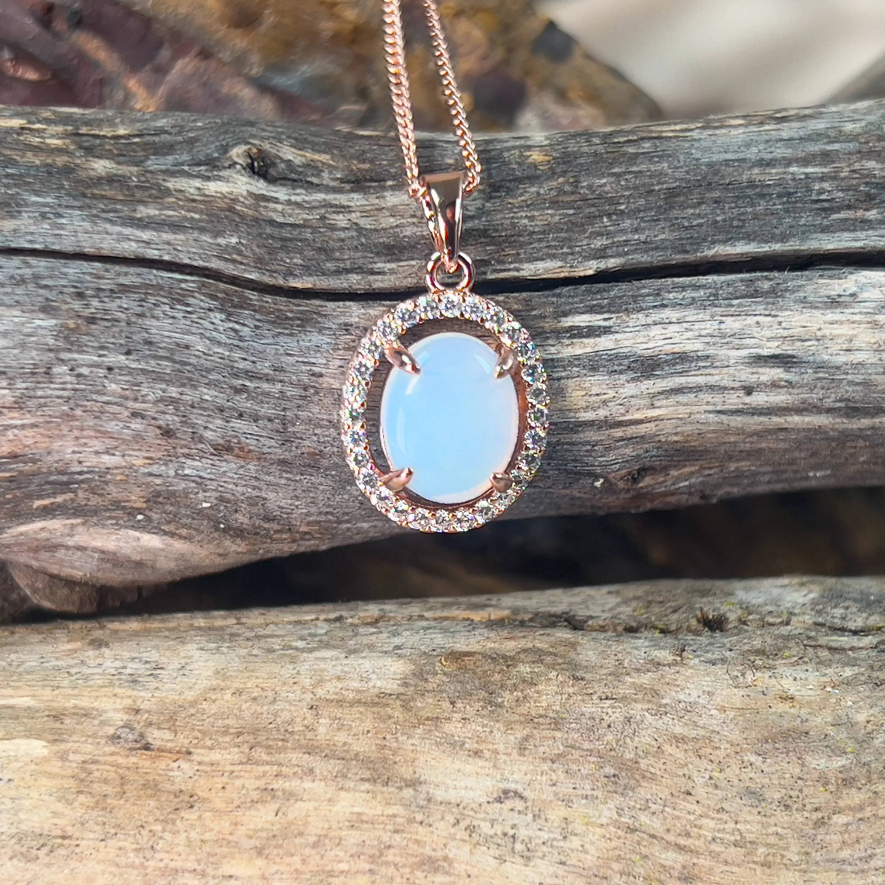 Rose Gold plated Halo 10x8mm White Opal silver pendant