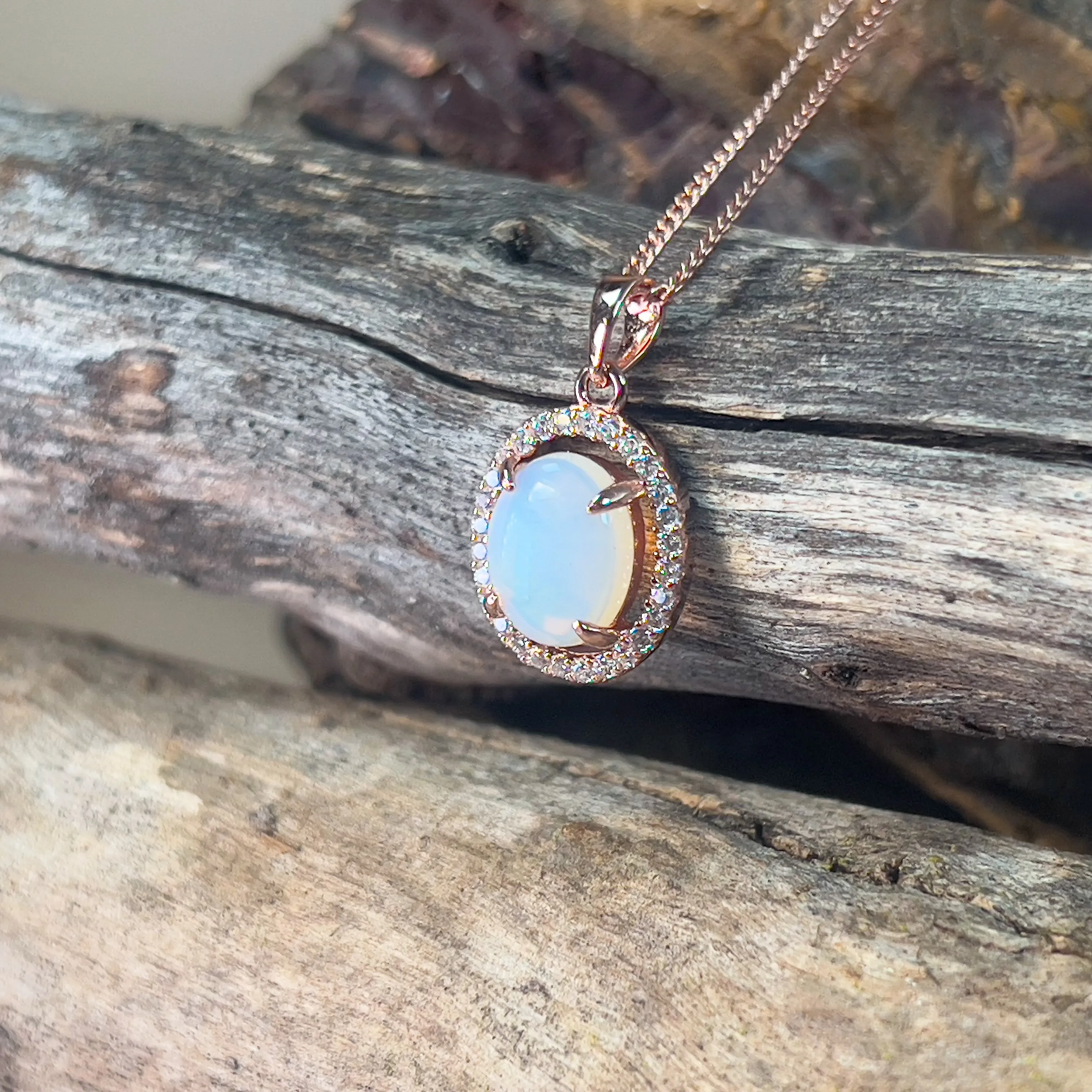 Rose Gold plated Halo 10x8mm White Opal silver pendant